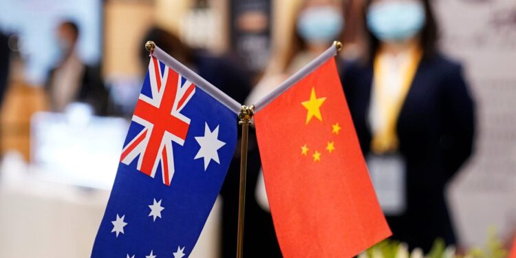 Australian and Chinese flags are seen at the third China International Import Expo (CIIE) in Shanghai, China November 6, 2020. REUTERS/Aly Song