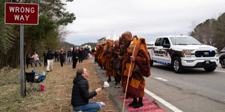 A group of Buddhist monks walked Pittsboro to Apex in North Carolina as part of their “Walk for Peace.”

Nearly two dozen monks from the Huong Dao Vipassana Bhavana Center, led by Bhikkhu Pannakara, are walking 2,300 miles to promote national healing, unity and compassion. The journey began Oct. 26 in Fort Worth and is expected to conclude Feb. 12.