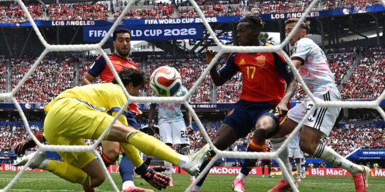 Spain's midfielder #06 Mikel Merino scores his team's second goal during the 2026 World Cup football tournament quarter-final match between Spain and Belgium at the Los Angeles Stadium in Inglewood on July 10, 2026. (Photo by Paul ELLIS / AFP)