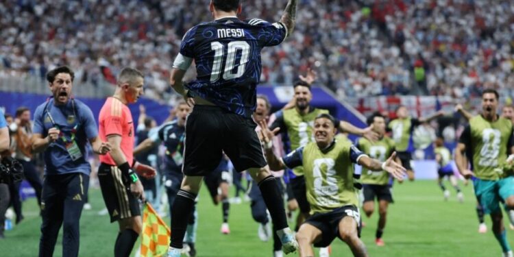 Argentina's forward #10 Lionel Messi celebrates his team's second goal scored by Argentina's forward #22 Lautaro Martinez (out of frame) during the 2026 World Cup football tournament semi-final match between England and Argentina at the Atlanta Stadium in Atlanta on July 15, 2026. (Photo by Thomas COEX / AFP)